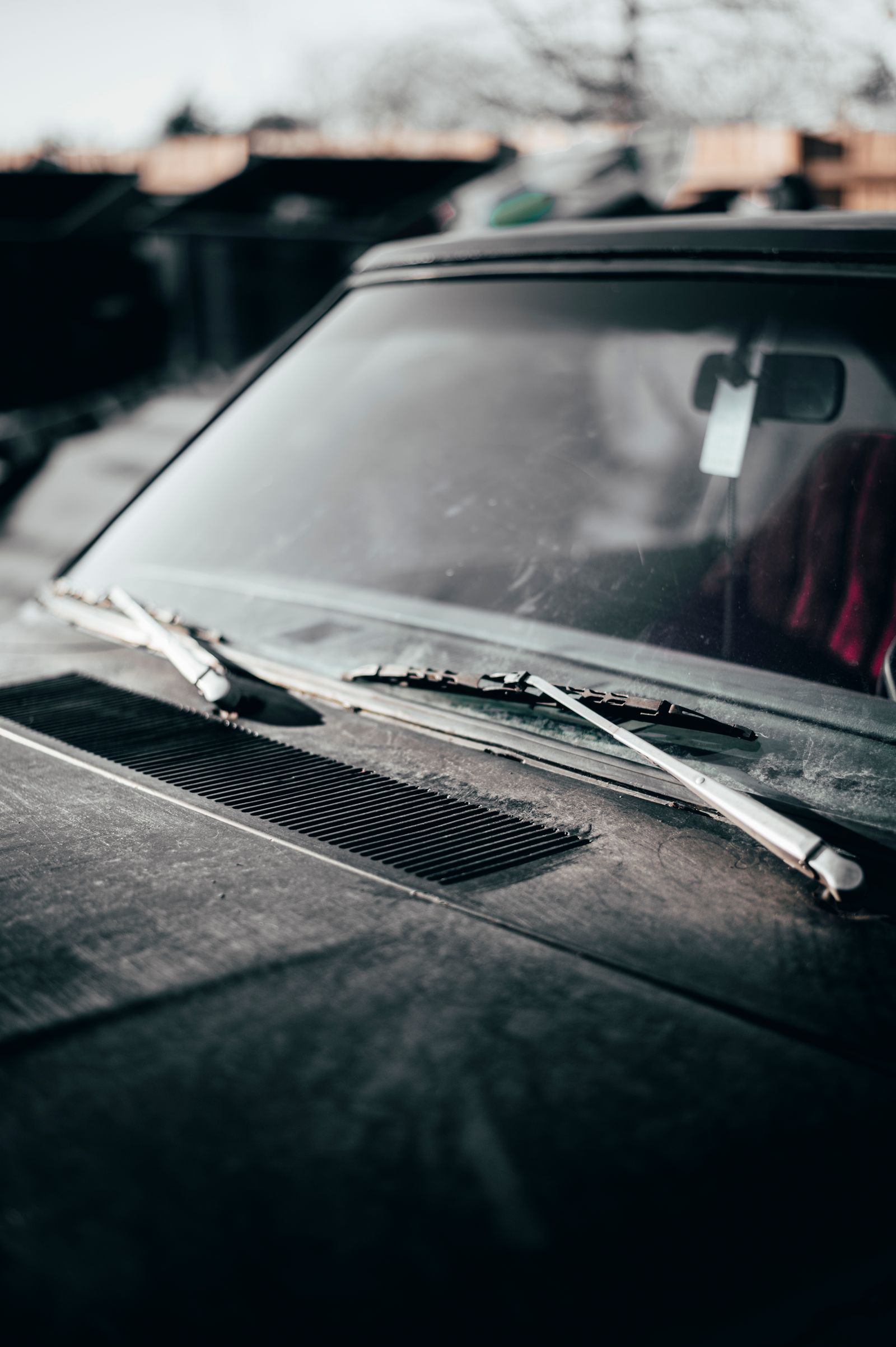 Front windshield and wipers of a vehicle
